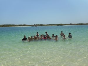 Students cool off in the Gulf waters at Rio Lagartos.