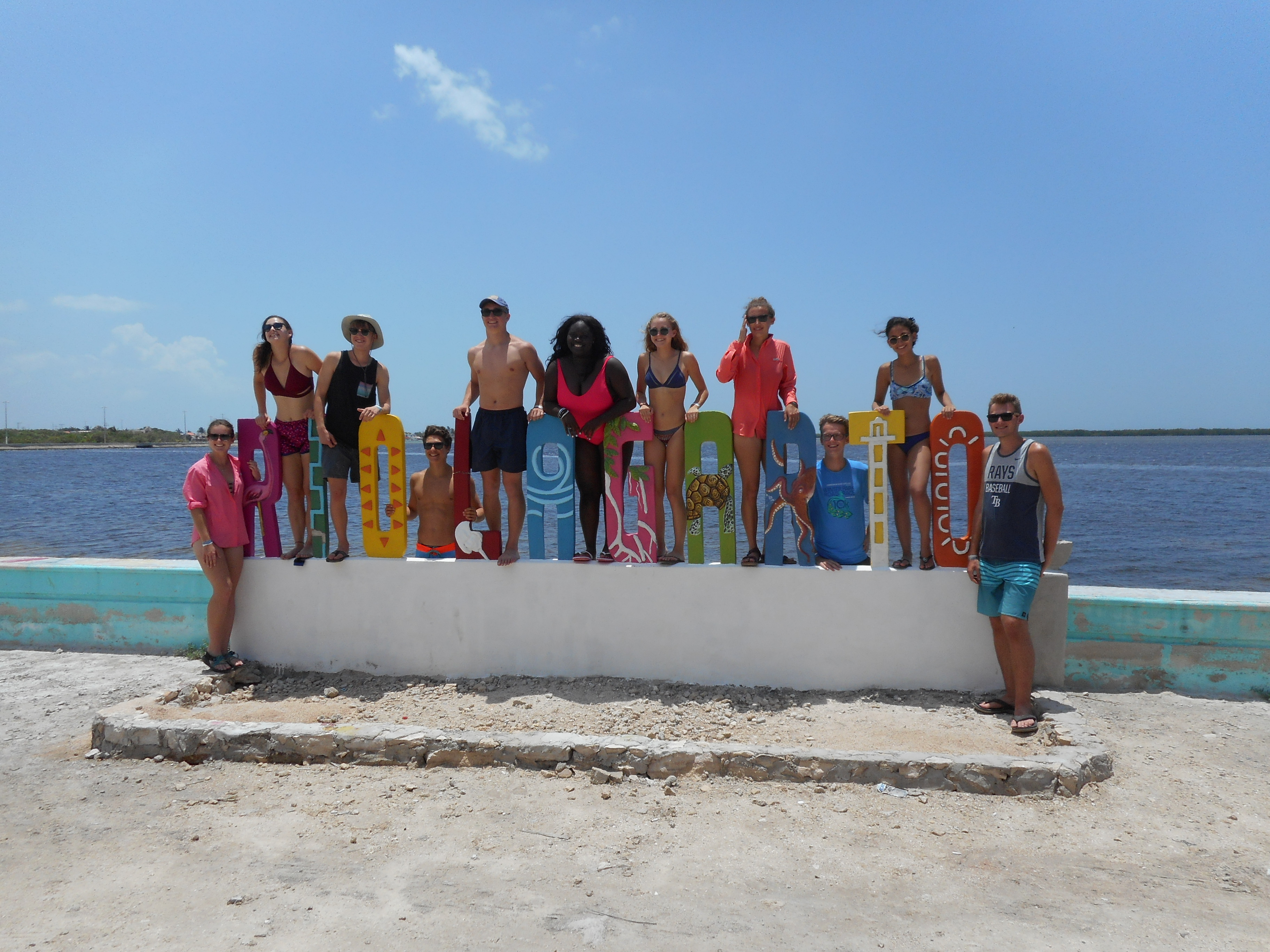 Group picture of students at beach